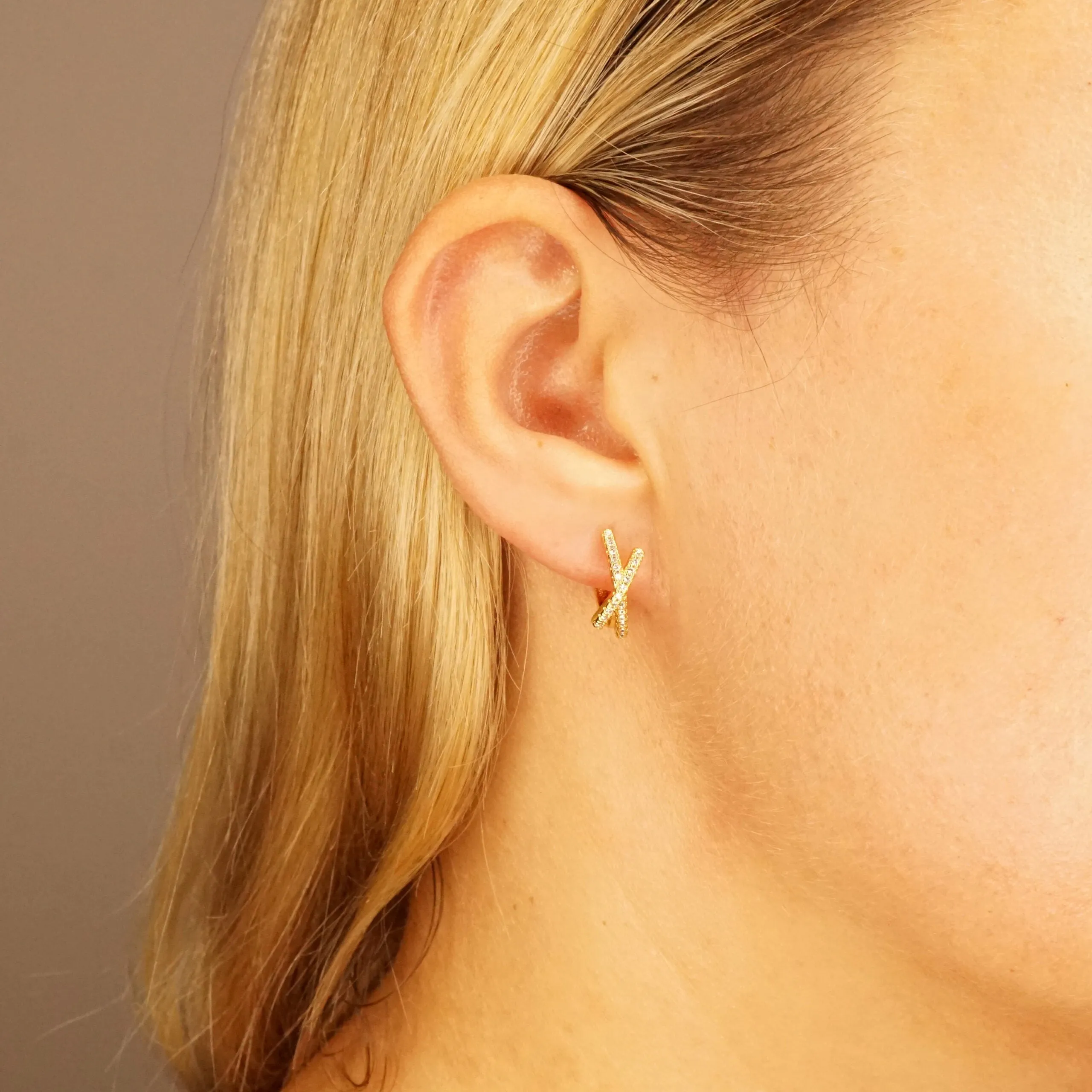 Ava X - Crystal Huggie Hoop Earrings in Gold or Silver