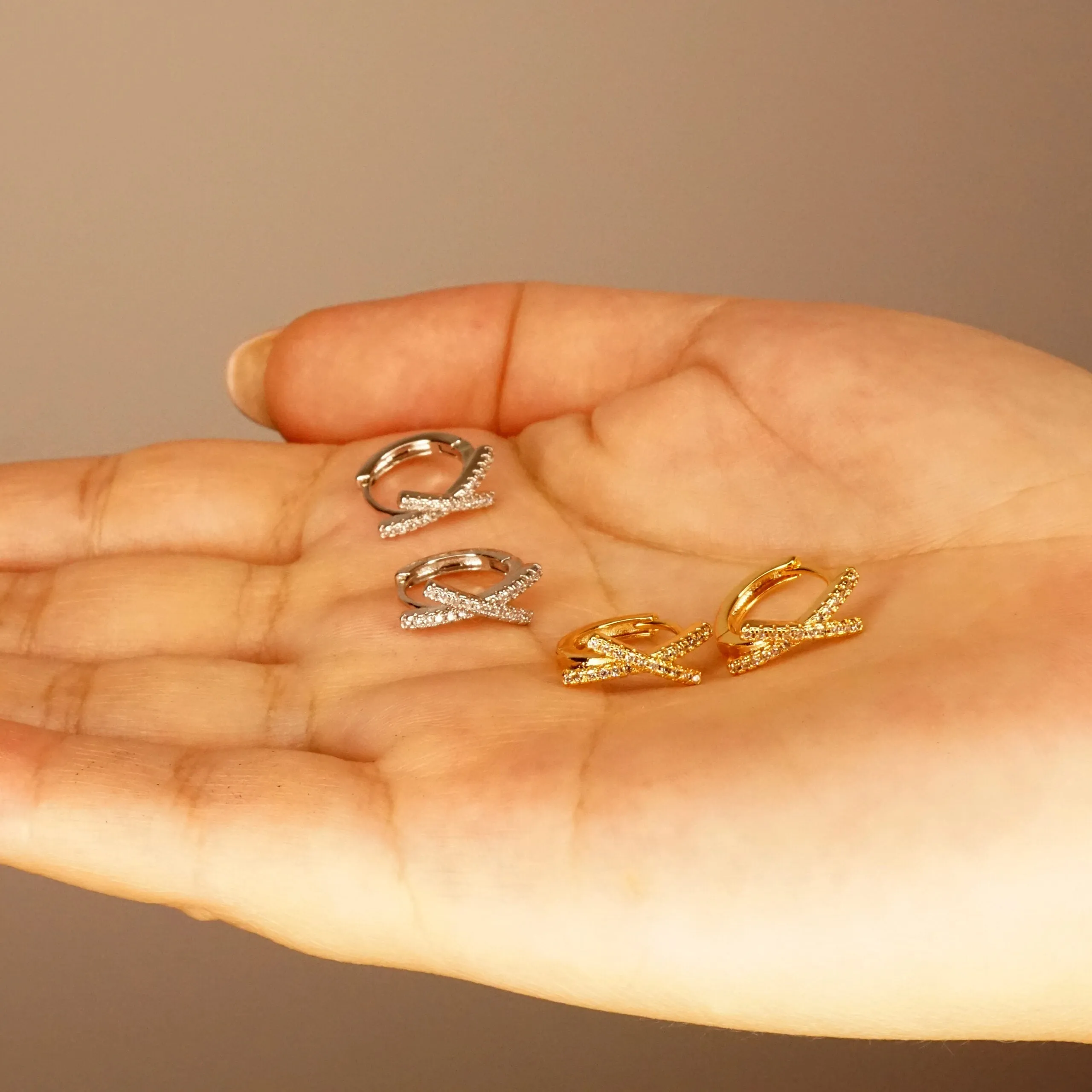 Ava X - Crystal Huggie Hoop Earrings in Gold or Silver
